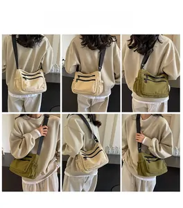Detailed model views showing large capacity nylon crossbody bag with functional zip pockets