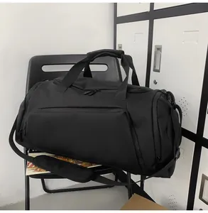 Close-up of durable fitness duffel bag with reinforced handles and heavy-duty dual zippers