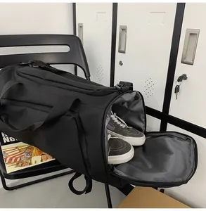 Detail of a black sports gym bag with a dedicated side shoe compartment for organized storage