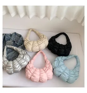 Collection of pleated hobo bags in silver, beige, black, pink and light blue colors