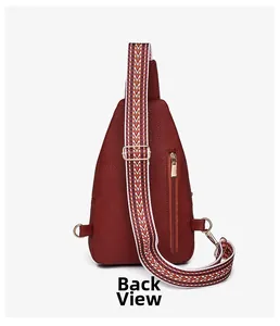 Rear view of burgundy crossbody bag featuring litchi texture and woven shoulder strap