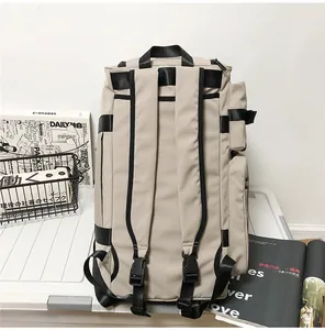 Close-up of waterproof travel backpack back panel with padded straps and chest buckle