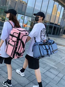 Large capacity waterproof travel duffel bags for gym and sports in pink and blue