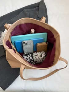 Quilted tote bag with large capacity interior and beige PU leather for daily commute