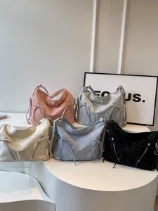 Pink fashion tote bag with multiple color options and unique wrinkled texture detail