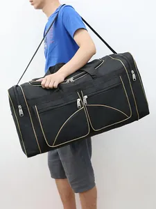 Large black travel duffel bag with multiple pockets and adjustable shoulder strap