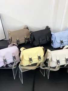 Japanese style nylon messenger bags in six colors with dual buckle closures for women