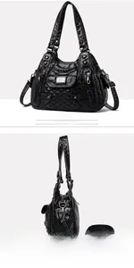 Detail view of black quilted PU leather shoulder bag with silver zippers and soft texture