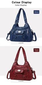 Detail view of blue and wine red quilted leather handbags with multiple zip pockets