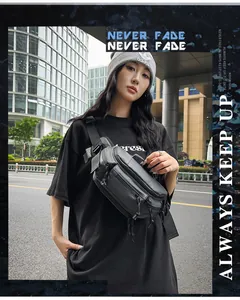 Detail of a black multi-pocket crossbody bag with paracord zippers in a street style