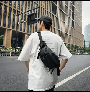 Men's black tactical crossbody bag with adjustable strap and multi-pocket street style