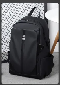 Close-up of black water-resistant laptop backpack with side buckles and textured fabric