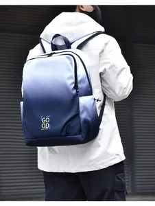 Blue and white gradient backpack with Good Luck text shown on model in outdoor setting