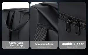 Detail of reinforced top handle, triangle stitching, and smooth dual metal zippers on backpack