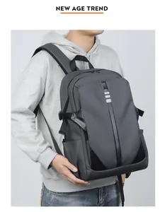 Detail view of water-resistant dark grey backpack with stylish striped texture on a model