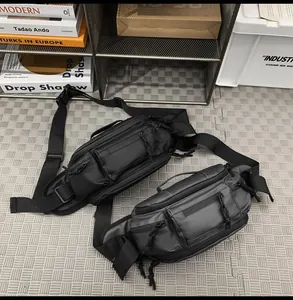 Tactical chest bags in black and grey showing multi-pocket design and waterproof fabric