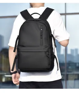 Close-up of a black high-capacity waterproof backpack with breathable shoulder straps