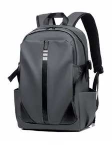 Side view of gray waterproof laptop backpack featuring reflective strips and padded straps