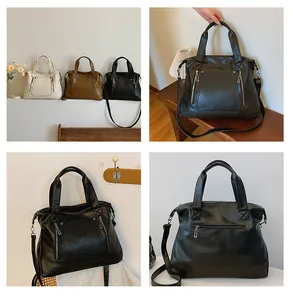 Vues détaillées de cabas vintage en cuir souple en blanc, noir et marron avec textures