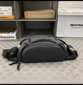 Detailed view of the dark grey tactical waist bag with matte waterproof nylon and adjustable strap