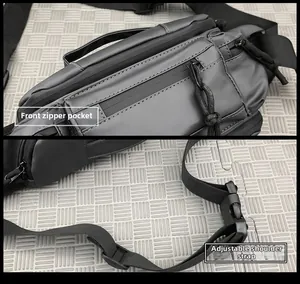 Detail of the front zipper pocket and adjustable strap system on the black tactical bag