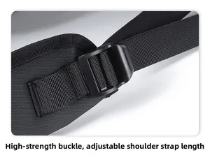 Detail of adjustable nylon shoulder strap with high-quality plastic buckle on black backpack
