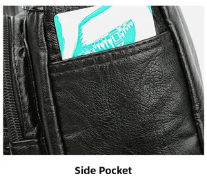 Détail de la poche latérale plaquée sur un sac cabas noir en cuir synthétique