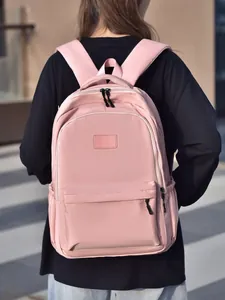 Sac à dos rose minimaliste pour l'école et les voyages avec bretelles rembourrées