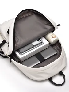 Large capacity white backpack with laptop compartment and honeycomb textured lining