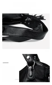 Detailed macro of black lychee grain leather tote bag handle and silver metal lock hardware