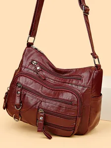 Sac fourre-tout tendance en cuir PU bordeaux avec design multi-poches et sangle ajustable