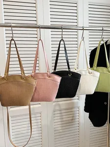 Large capacity pleated leather tote bags for women in khaki, pink, black, and white colors