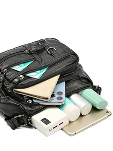 Sac fourre-tout tendance 2025 en cuir PU noir avec plusieurs fermetures éclair et grande capacité