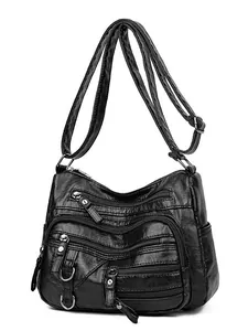 Sac fourre-tout tendance en similicuir noir avec poches zippées et bandoulière réglable