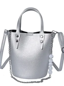 Silver bucket bag with litchi texture, metal chain and marble bead handle details