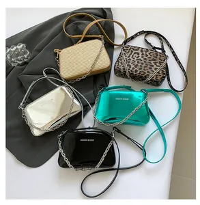 Detailed collection of textured crossbody bags featuring chain straps and metallic finishes