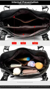 Detailed view of the black tote bag interior with multiple compartments and zippered pockets