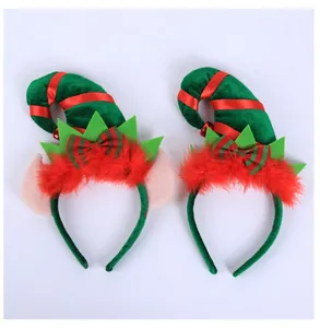 Detailed view of Christmas elf headbands with velvet hats, feathers, and plaid bows
