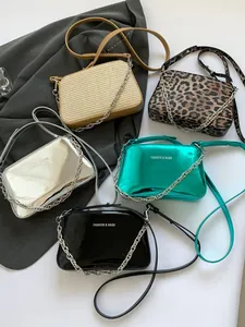 Chic chain crossbody bag in five stylish finishes including leopard print and silver