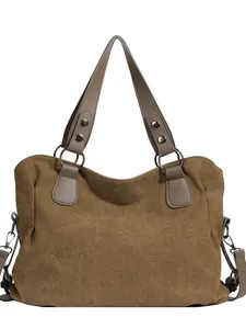 Grand sac à main en toile minimaliste avec anses marron foncé et accents d'anneaux métalliques