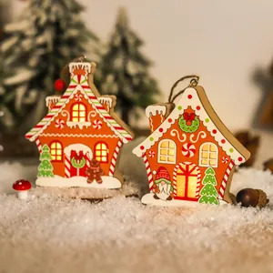 Wooden LED Christmas house ornaments with gingerbread man and gnome designs on snow