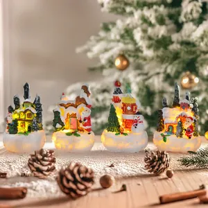 Set of 4 Christmas lighted resin house figurines with Santa Claus and Snowman
