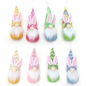 Set de 8 gnomos de Pascua de peluche con orejas de conejo y sombreros de colores