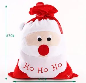 Detail of Santa Claus Christmas gift bag showing soft fleece fabric and 67cm height dimension