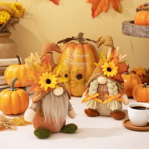 Fall themed gnome plush decor with sunflowers and maple leaves for Thanksgiving tabletop
