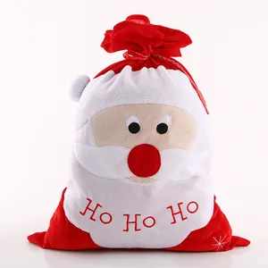 Christmas Santa drawstring gift bag with red plush fabric and HO HO HO embroidery