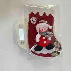 Detail of Christmas snowman linen stocking showing the lightweight 25.1g product weight