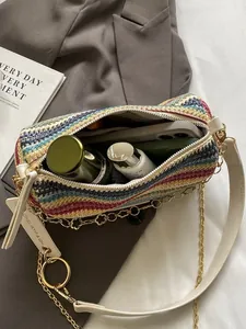 Rainbow woven straw bucket bag with gold chain strap and spacious interior