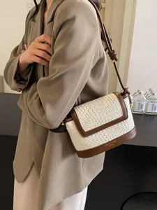 Sac à bandoulière tissé contrasté pour femme avec garniture en cuir et bandoulière