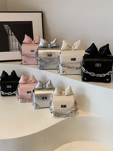 Mini crossbody tassen met strik en ketting in roze, zilver, wit en zwart voor dames
